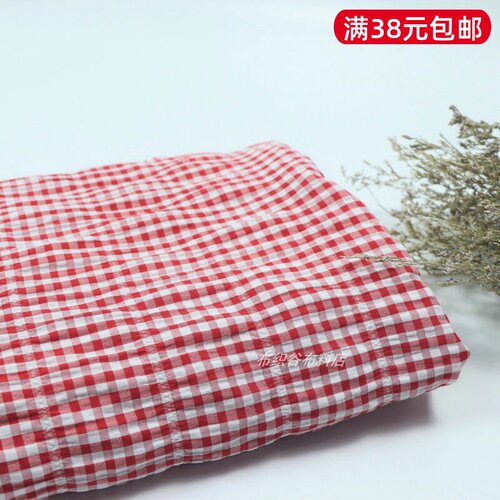 大红白色泡泡格子涤棉服装布料