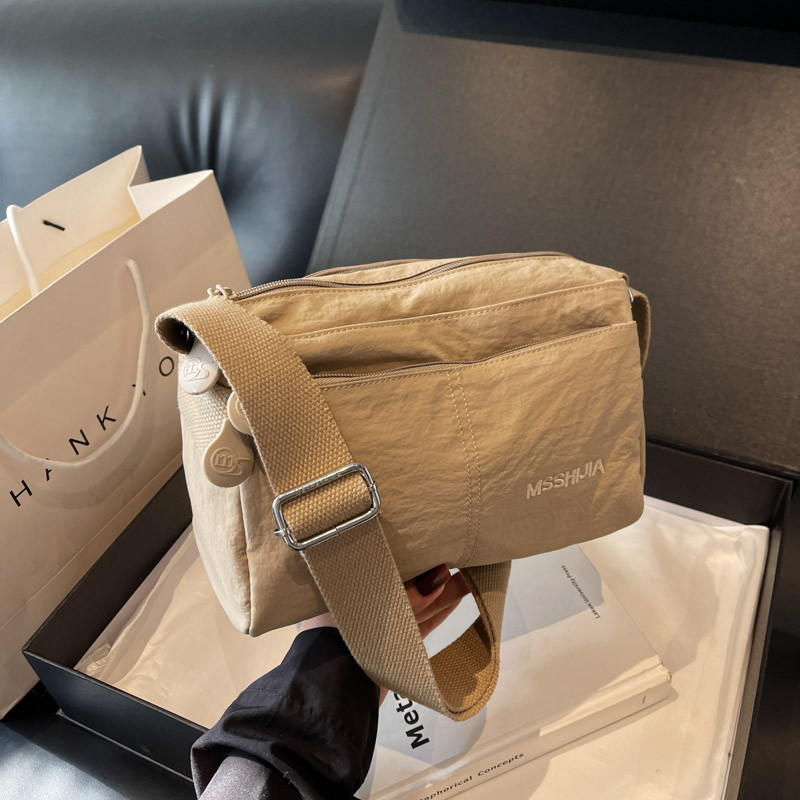 2026新款潮帆布包男女同款多层百搭轻便斜挎包休闲大容量单肩包