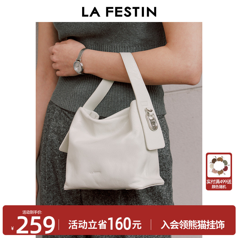 拉菲斯汀可乐包女新款夏天白色头层牛皮水桶包真皮斜挎小众手提包