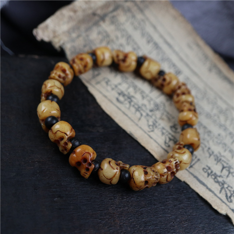 藏民手工雕刻天然油润牦牛骨骷髅头骨珠手串西藏灵骨珠精品配手串