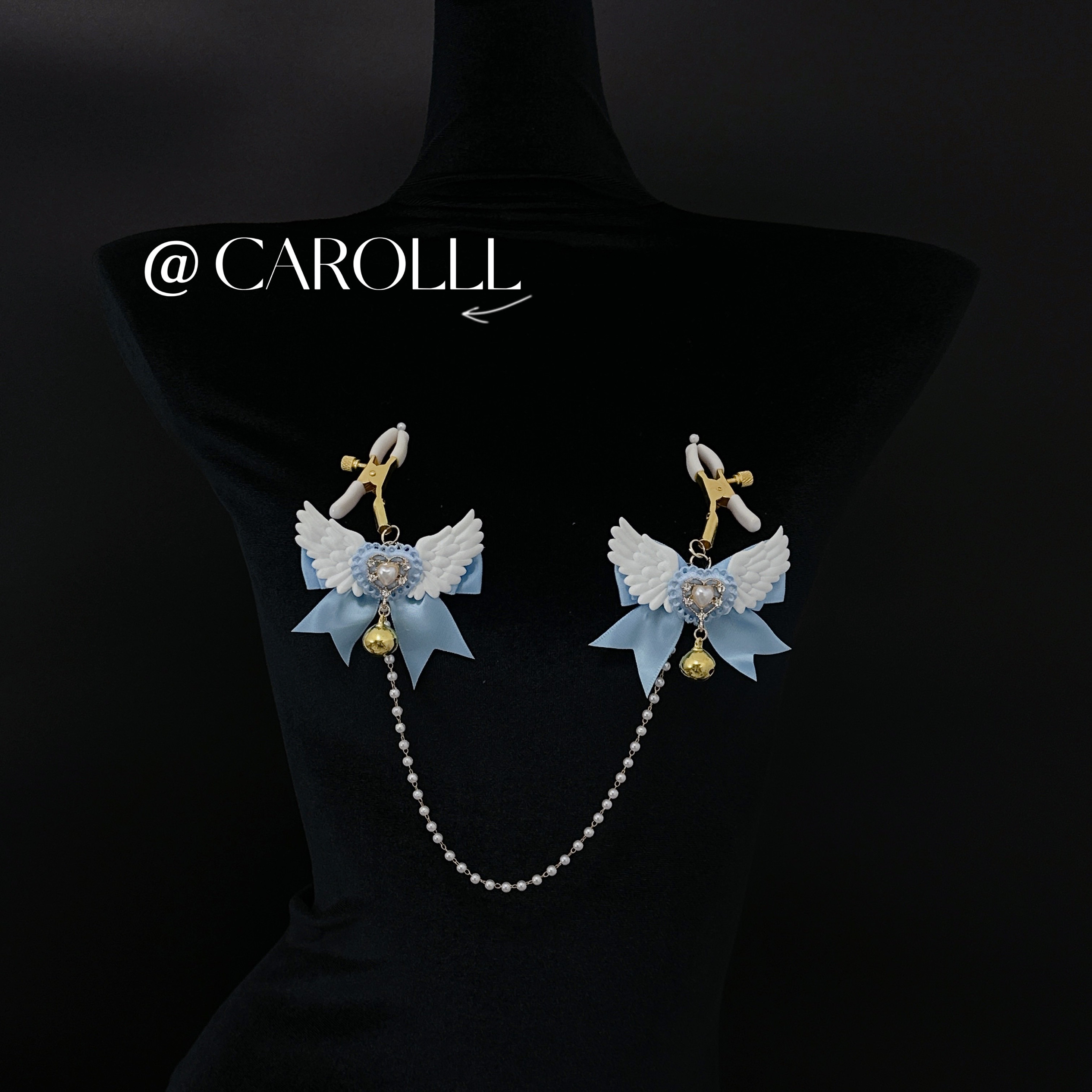 CAROLLL淡蓝的温柔回响_流苏蝴蝶结链条乳夹摇曳可爱图片