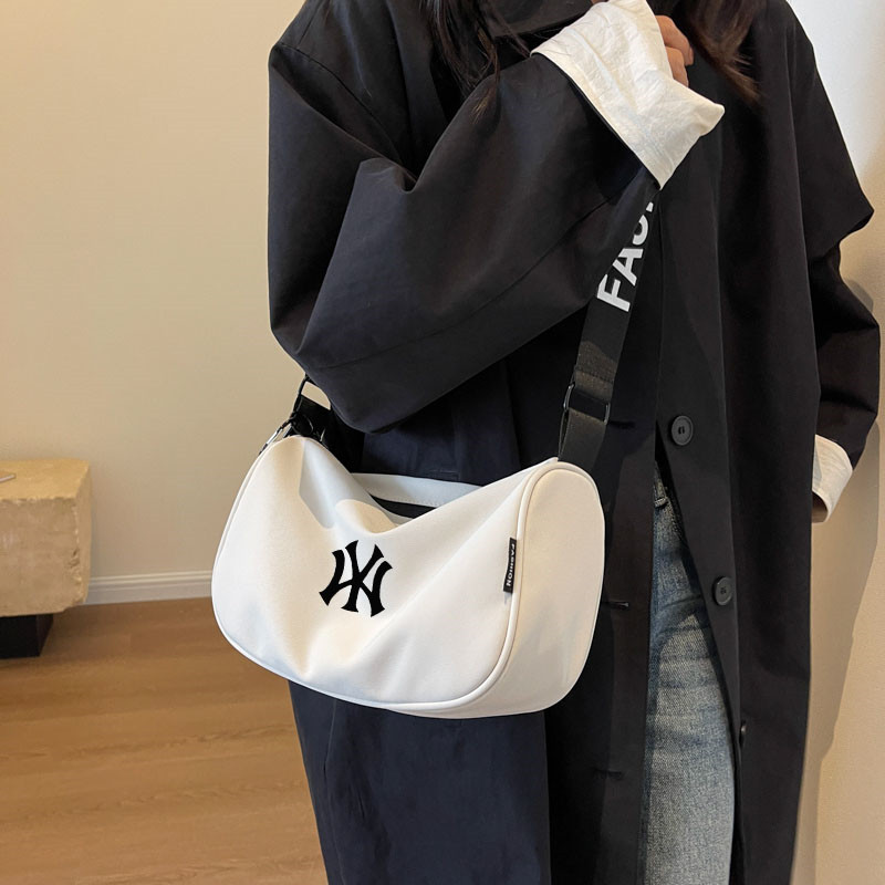 NASA联名潮流简约百搭单肩斜挎包男女外出轻便背包2026新款饺子包