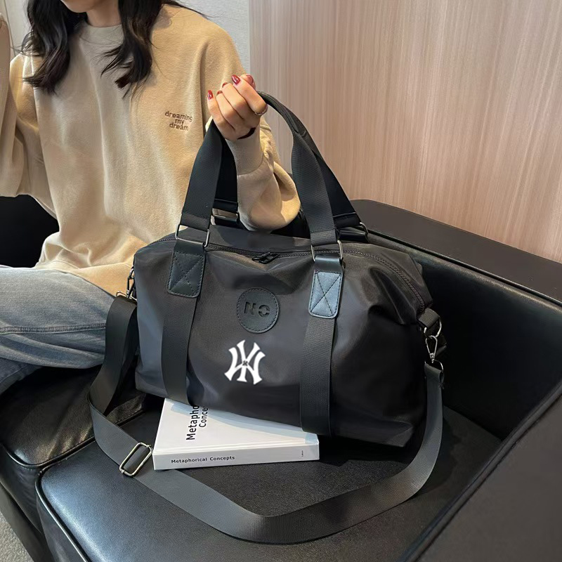 NYMS潮牌男女通用防水旅行包