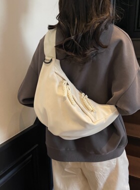 2026新款潮单肩腋下包高级感时尚休闲纯色饺子包胸包女小众设计