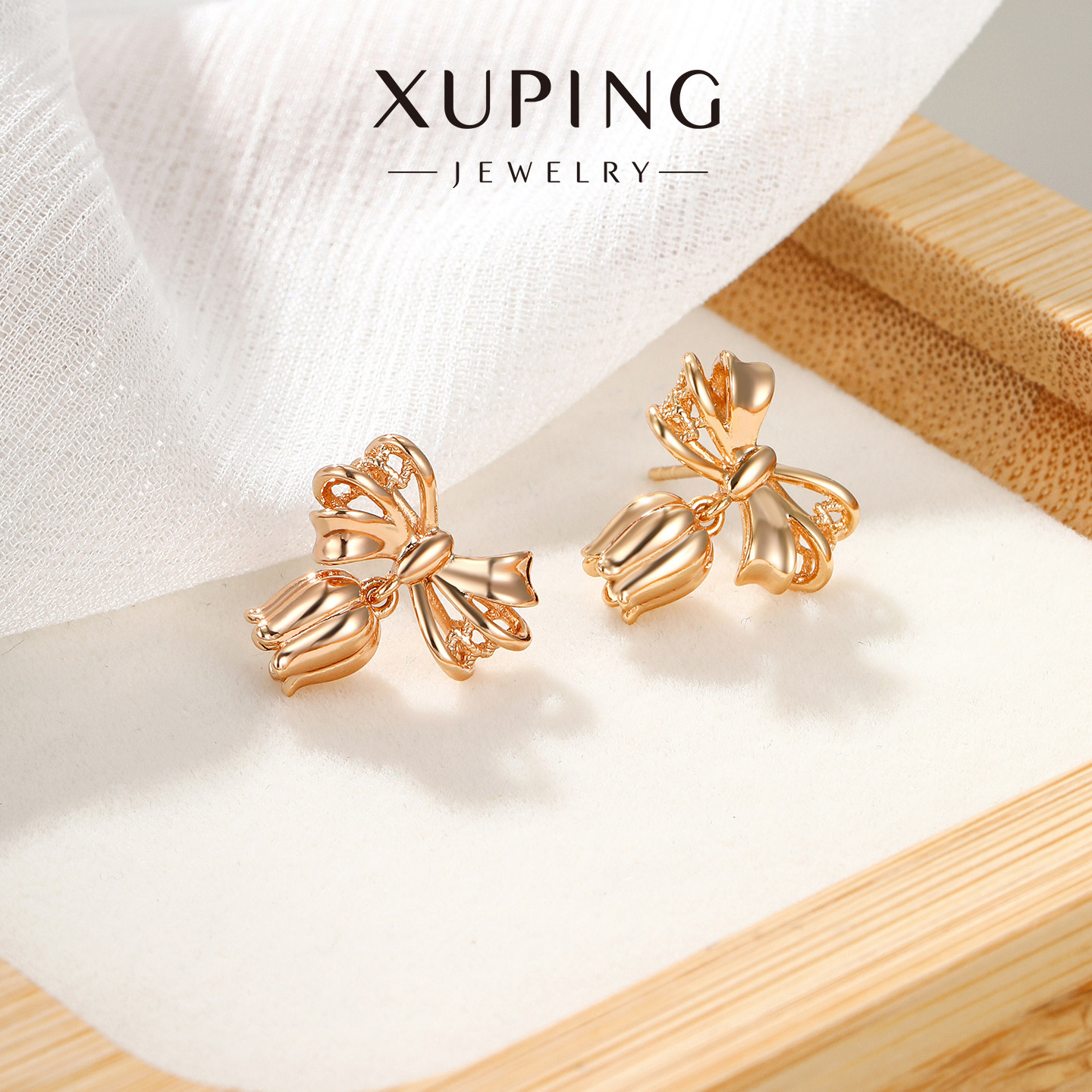 旭平甜美灵动元素铃兰花造型蝴蝶结元素合金耳饰耳针