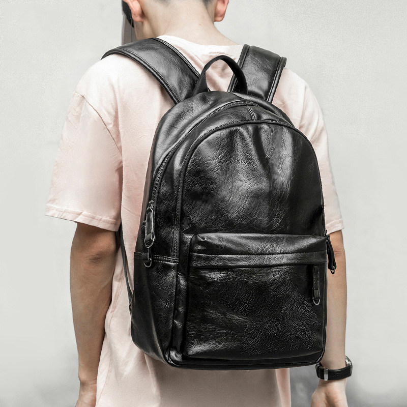 麦哲新款男士双肩包皮学生电脑包休闲商务出差背包时尚潮流书包男