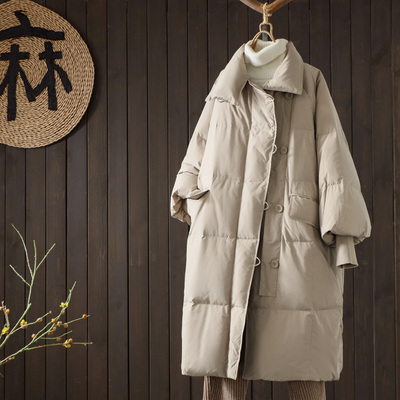 纽扣2024冬季羽绒服简约大气连帽