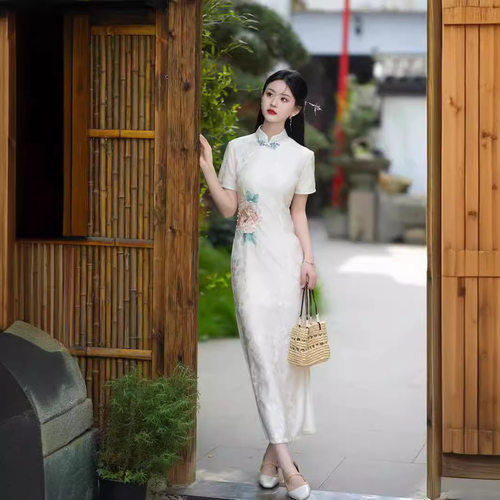 一珂锦绣女装懿菲奥黛2026新款一城风絮俏娘鱼年轻新中式绝美旗袍