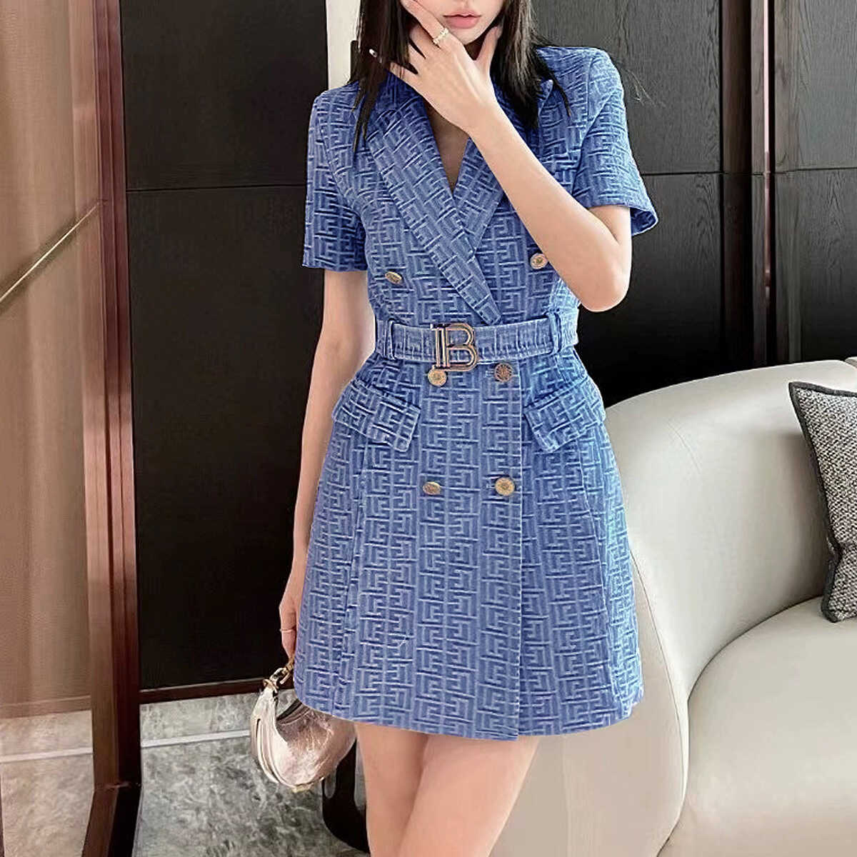 牛仔纯色气质纽扣服饰A字群
