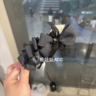 650415韩国东大门Baket新款时尚流行甜美蝴蝶结香蕉夹