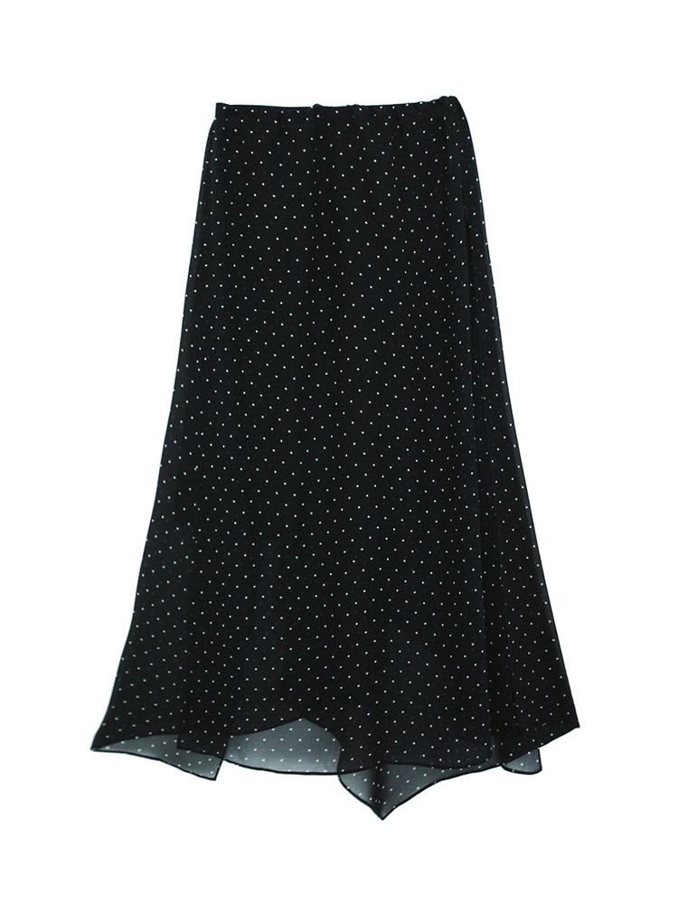 Black polka dot skirt laid flat on a white background