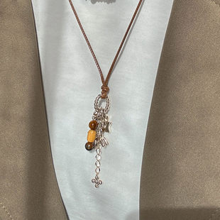 棕色皮绳民族风虎眼石吊坠项链女款高级感轻奢小众长款秋冬毛衣链