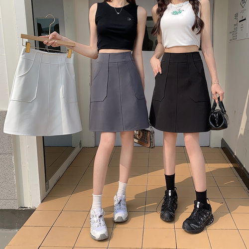 设计感a字中裙口袋包臀半身裙