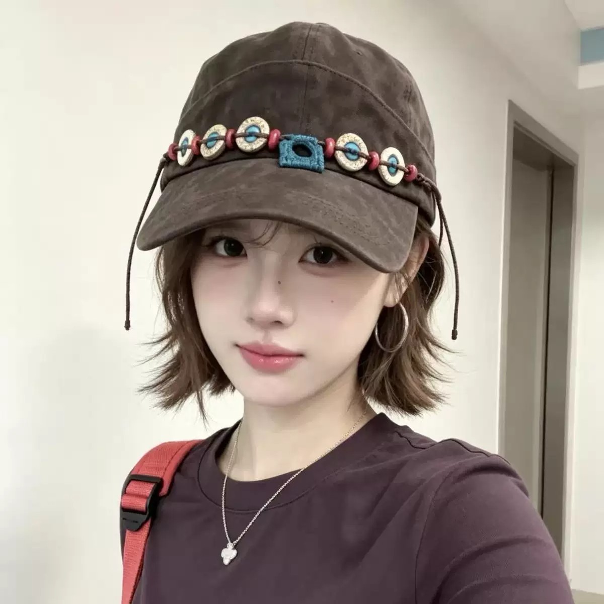 民族风流苏串珠麂皮绒棒球帽女