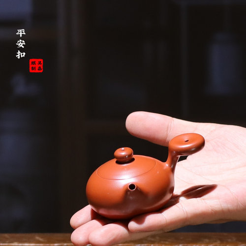 吴嘉麒手拉壶朱泥平安扣壶