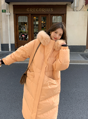 橙色长款狐狸大毛领羽绒服女冬季2025新款加厚高端连帽白鹅绒外套