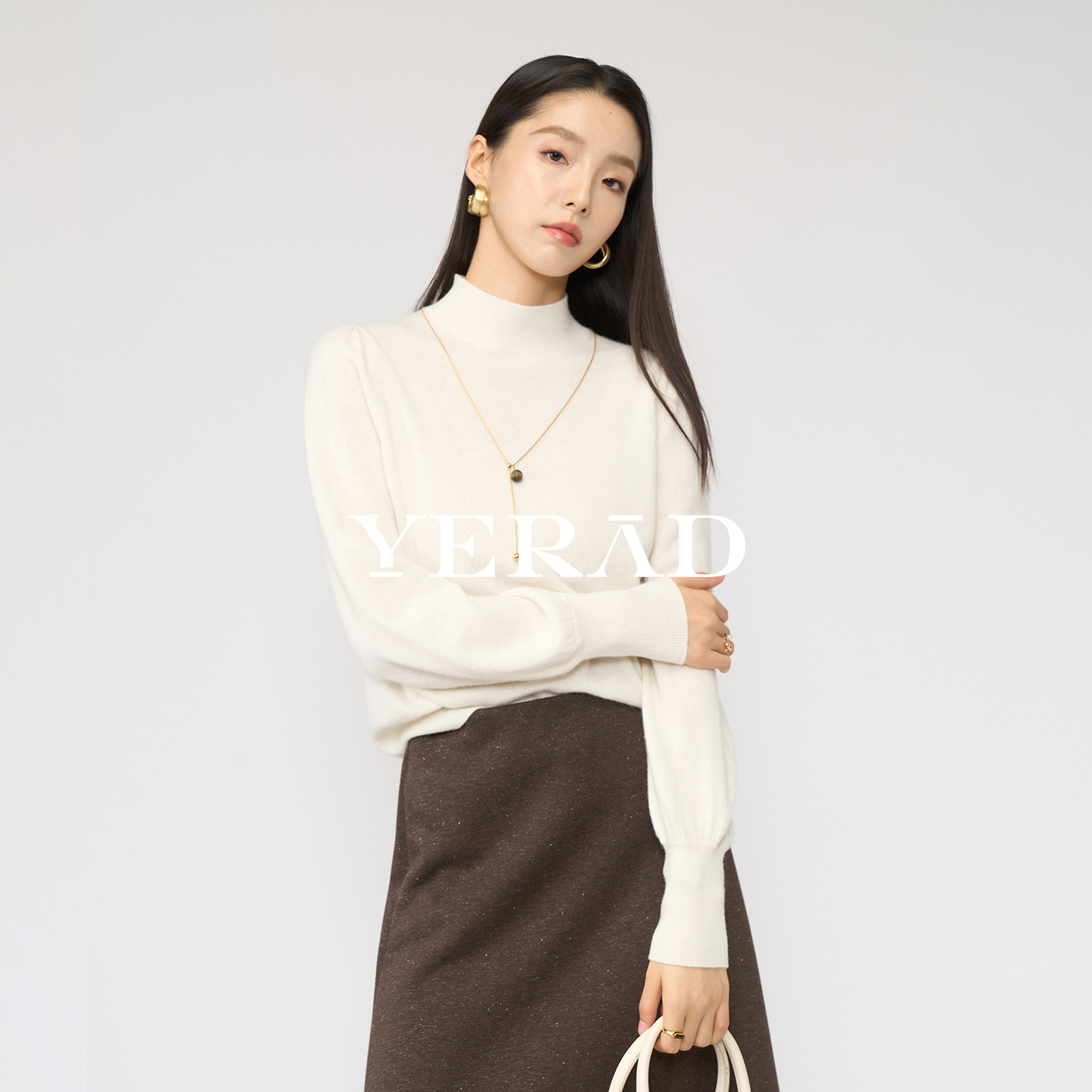 娅丽达半高领米色山羊绒针织衫女