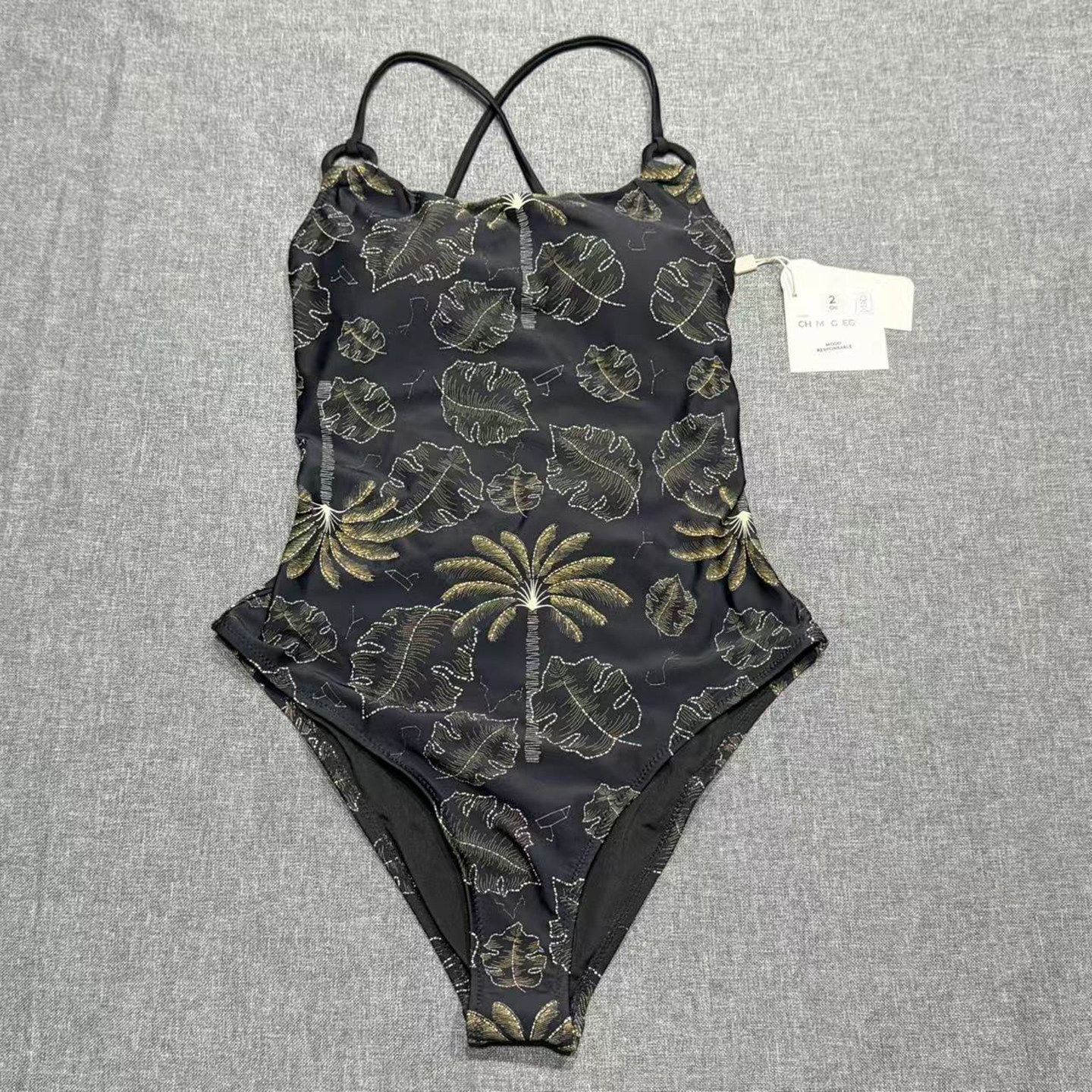 出口欧美女成人平领双肩带圆环饰品花朵大露背绑带三角连体游泳衣
