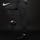 934593 男子运动休闲舒适透气梭织束脚长裤 010 耐克正品 Nike