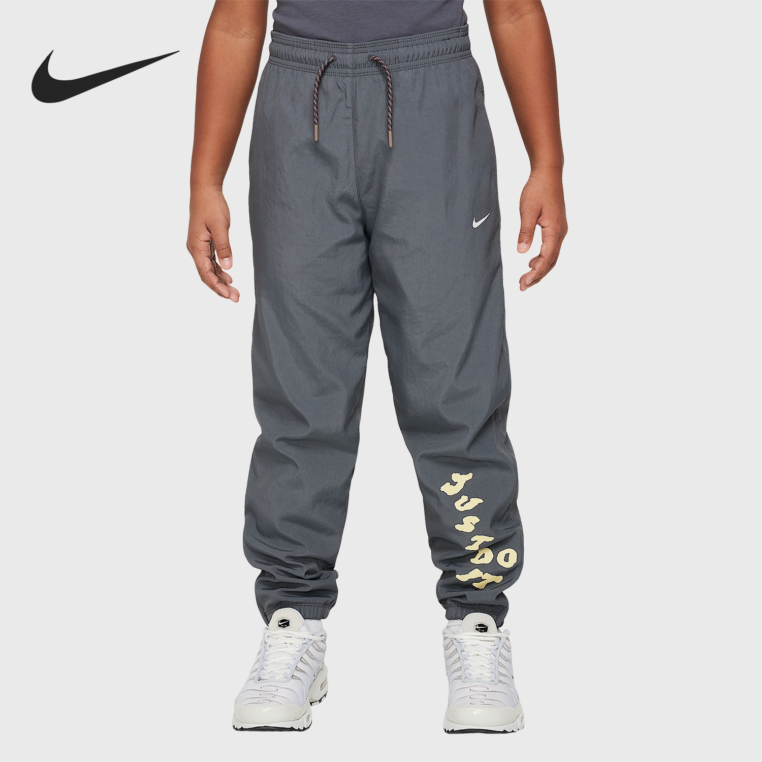 Nike/耐克正品春季新款大童运动梭织宽松束脚长裤IB5593-068