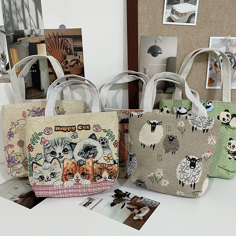 新款爆款民族风小手机包手拎外出高颜值时尚帆布包双面金丝图案