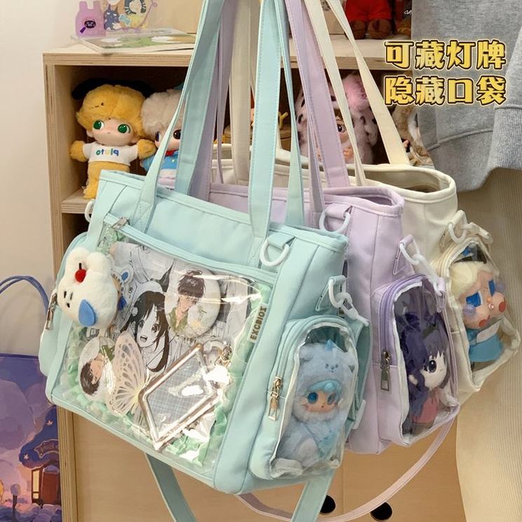 高颜值学院风百搭简约大容量邮差包女透明吧唧单肩包斜挎娃包痛包