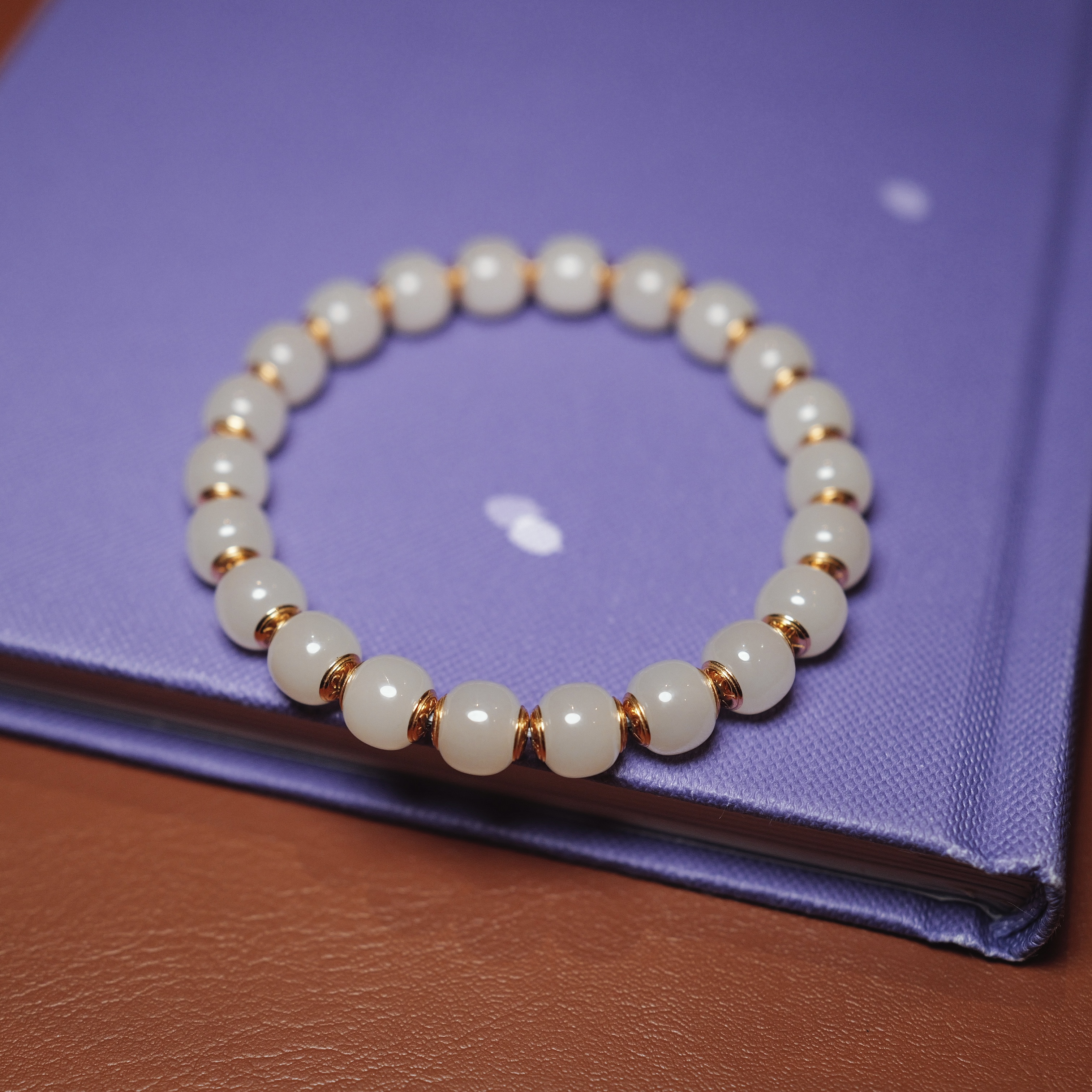 秋会长的和田玉金盾手串籽料焊接