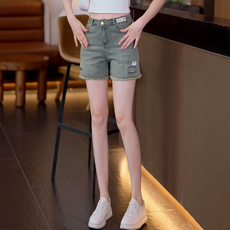 翡翠绿毛边牛仔短裤女202图片