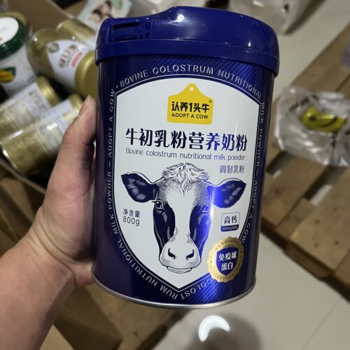 认养一头牛奶粉牛初乳营养800g成人学生奶粉送礼3岁以上全家适用