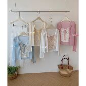 十三行26早春韩系简约清新排扣针织开衫 女7033 吊带碎花背心套装