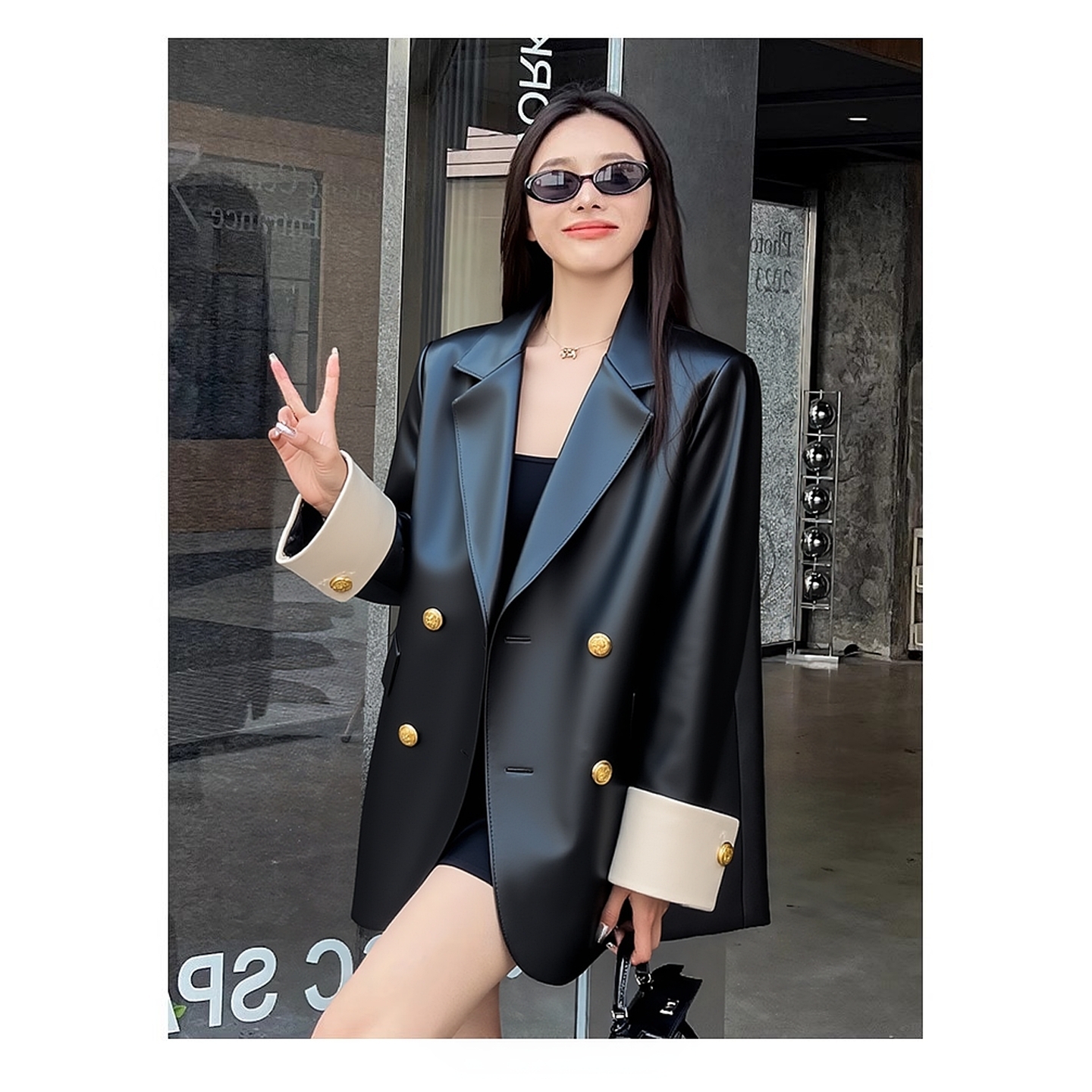 黑色皮西装外套女春秋高级感2025秋冬宽松PU皮衣机车服金属扣西服