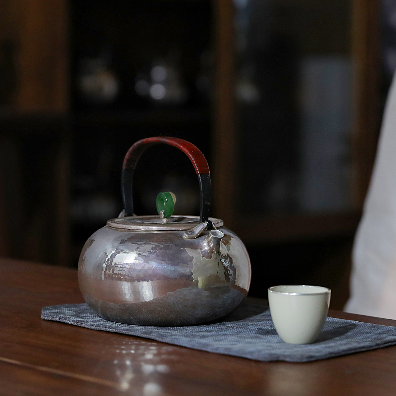 纯银999一张打锤纹釉面煮茶壶