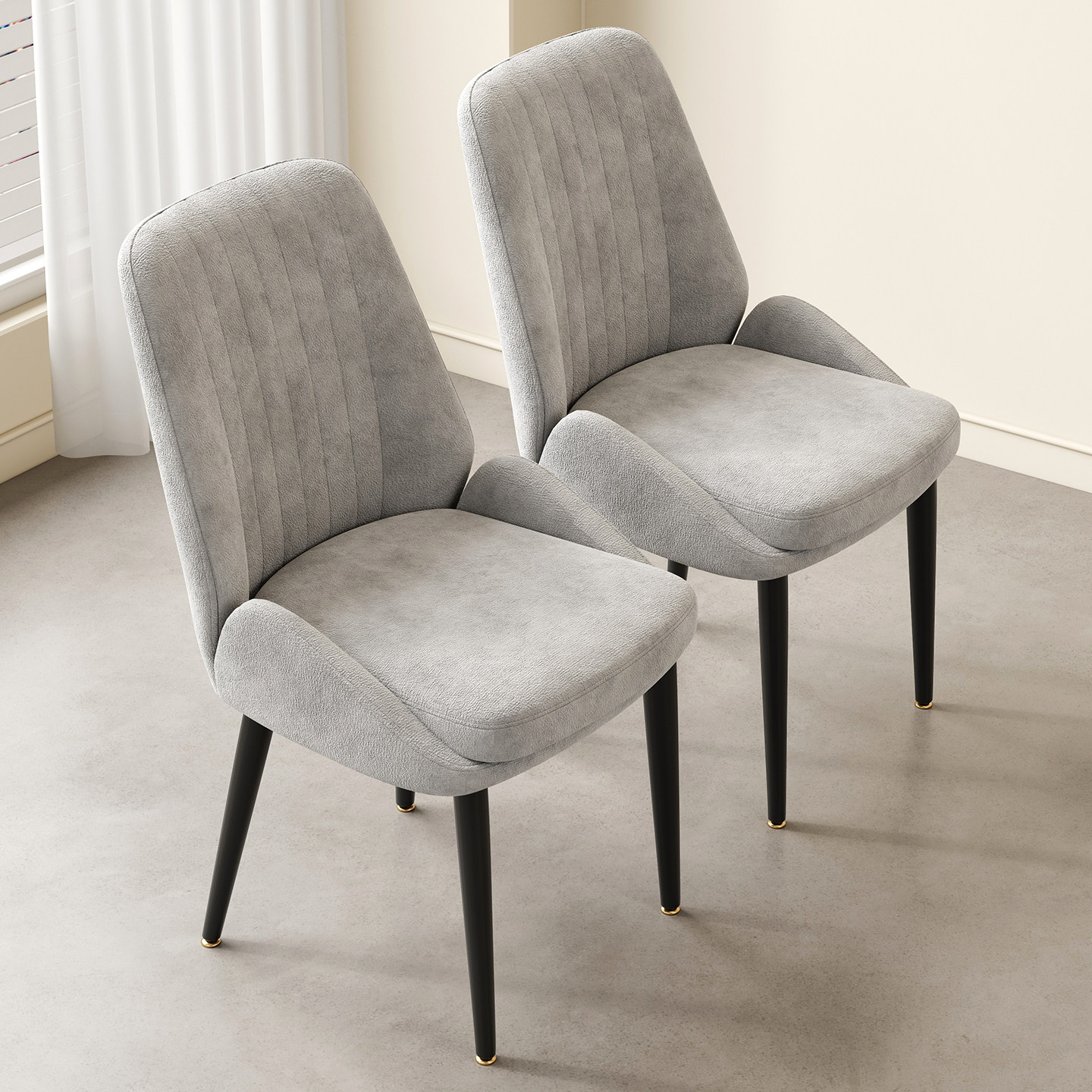 新款北欧现代轻奢家用餐椅网红餐厅酒店高级感真皮牛皮餐桌椅子