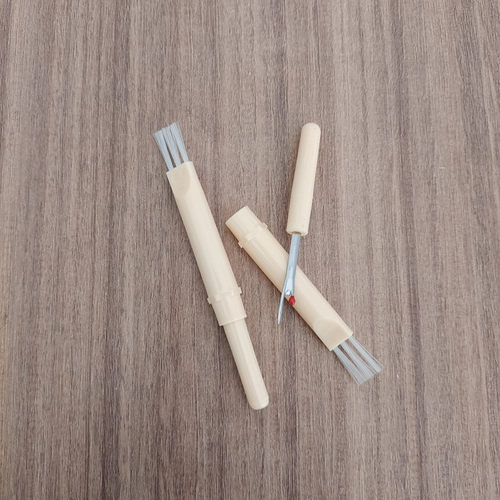 缝纫机毛刷拆线器扣眼刀一体