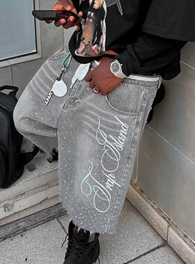 Knee length embroidered rhinestone denim shorts