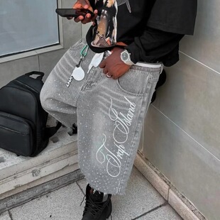 Knee length embroidered rhinestone denim shorts