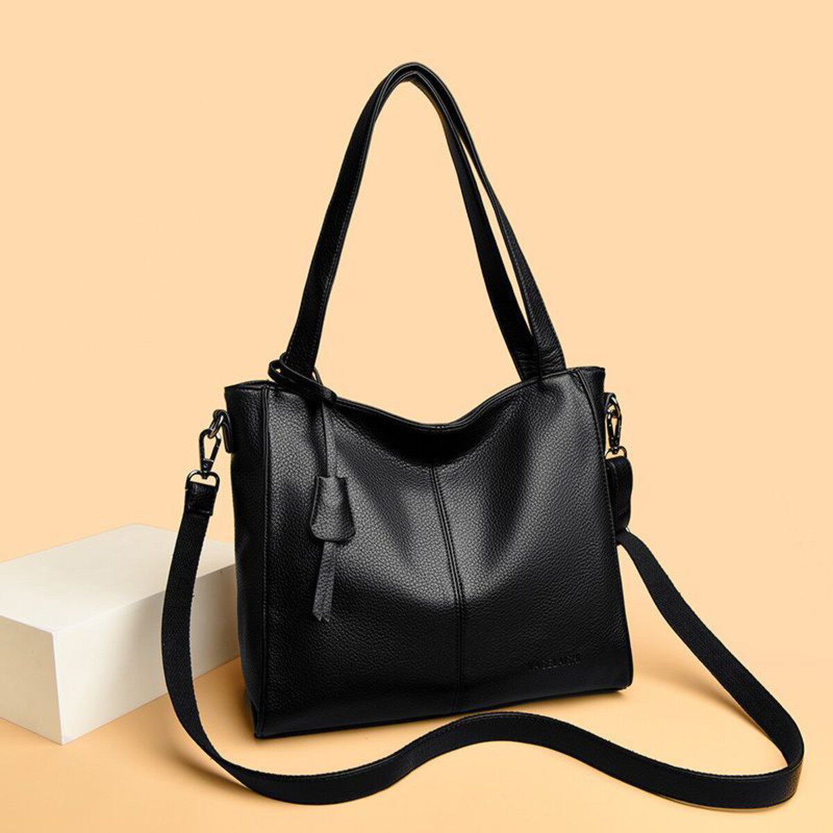 Aman真皮包包女新款水桶包大容量通勤包时尚宽肩带单肩斜挎包