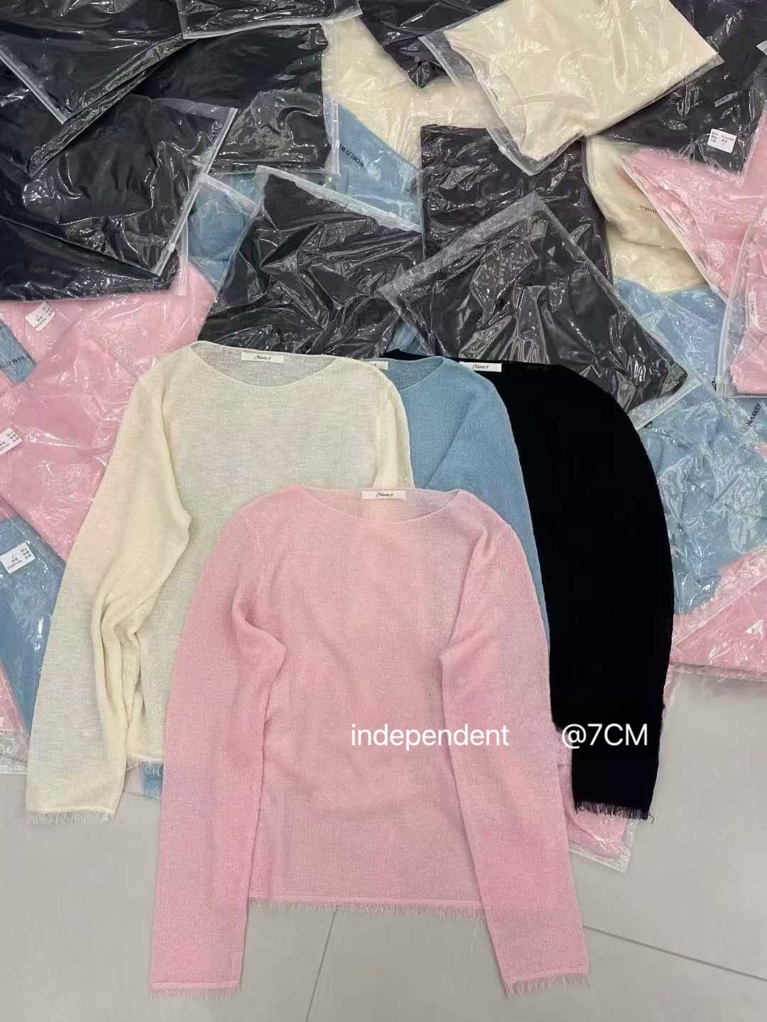 韩国货现货2026春款米白色透感针织衫女新款百搭圆领套头上衣轻薄