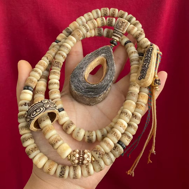 藏式牛骨嘎嘎108颗套装男女通用驼骨回流开片炸纹老形批发