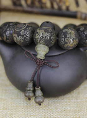 四川金丝楠阴沉木雕刻貔貅珠手串