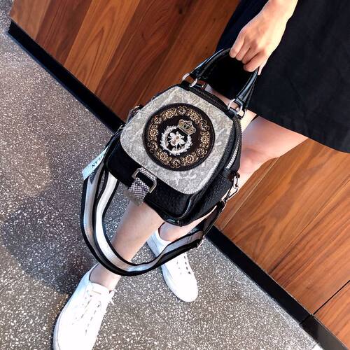 百搭洋气风女士休闲真皮双肩包