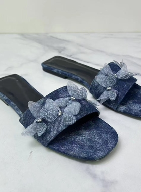 西班牙2024夏季新品TRF 一字带蓝色凉拖牛仔蝴蝶装饰复古平底凉鞋