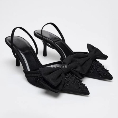 西班牙2025春季新款尖头浅口女鞋黑色蝴蝶结饰网布露高跟穆勒凉鞋