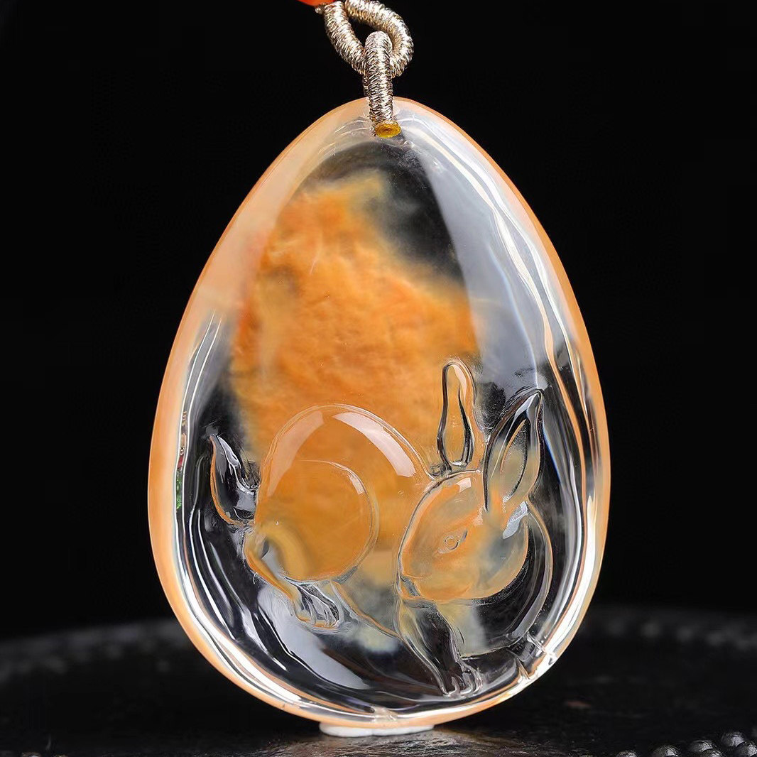 魅晶天然原矿水晶晶体通透红兔毛红水晶原石雕刻生肖兔吊坠