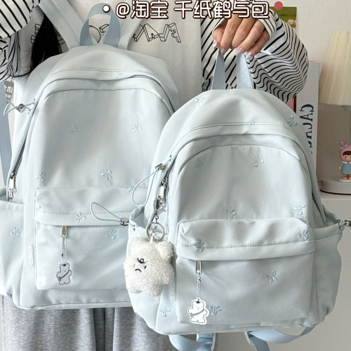 新款纯色书包女学生休闲时尚通勤双肩包韩版轻便简约旅游百搭背包