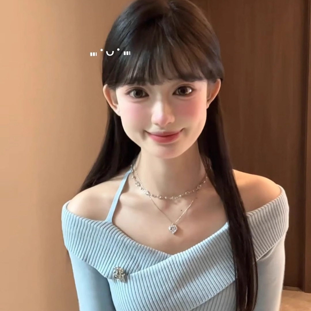 韩系蓝色一字肩挂脖针织衫女秋季设计感小众交叉修身显瘦短款上衣