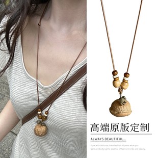 新中式复古禅意果实项链2025新款爆款吊坠高级感轻奢小众锁骨颈链