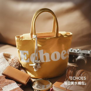 马登复古时尚手拎单肩黄色帆布水桶包斜挎包小个子单间手提包包女