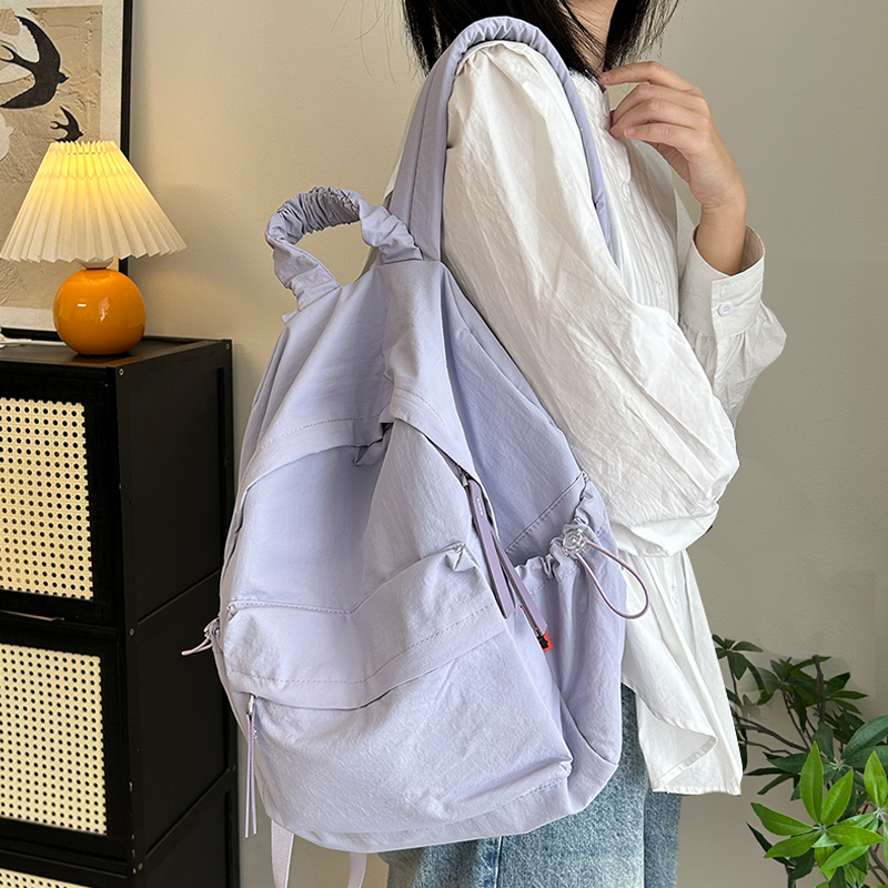 新款双肩包小众高级感轻便旅行背包软糯妈咪包休闲百搭中学生书包