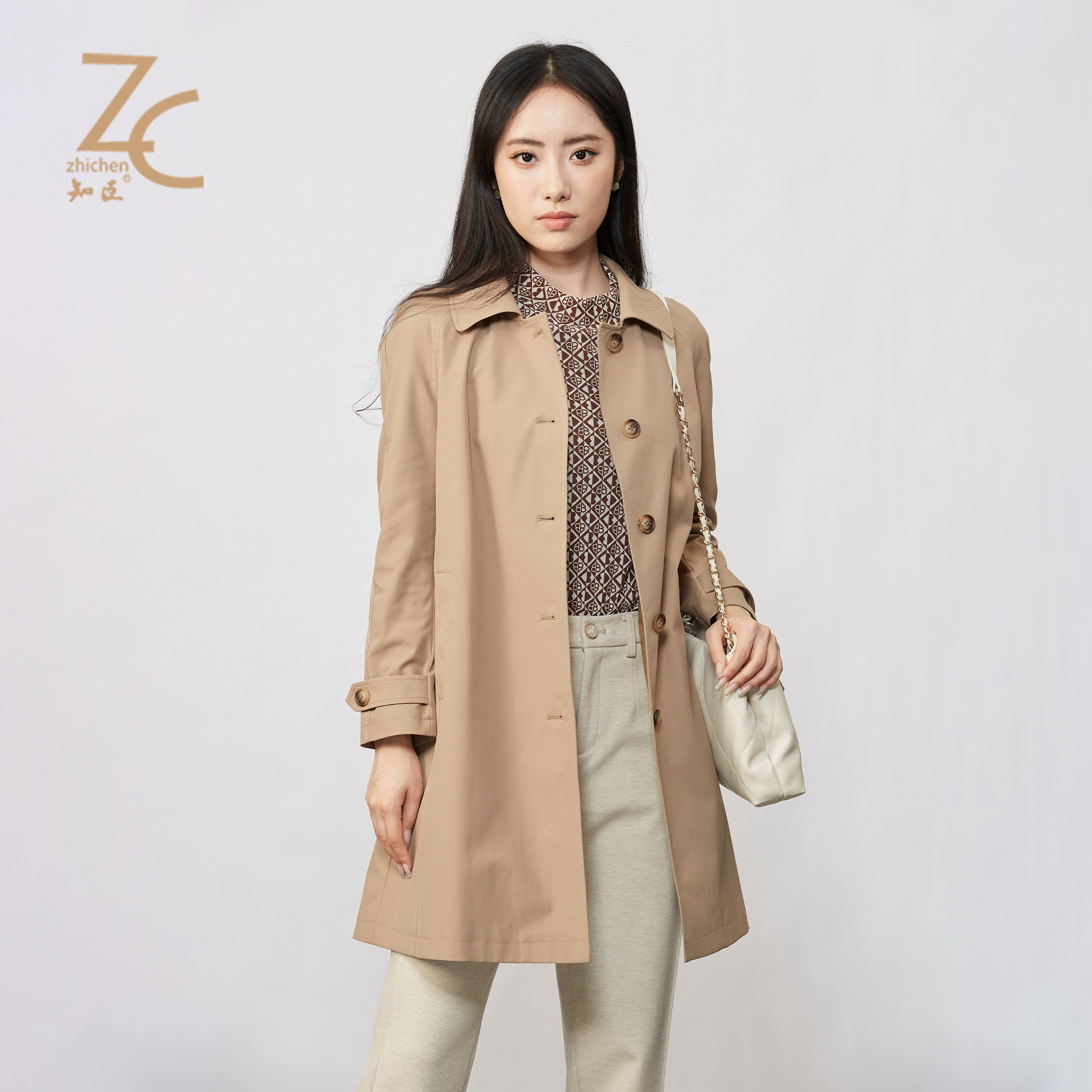 知臣春季新品 简约休闲单排扣插肩显瘦袖风衣女 18241013